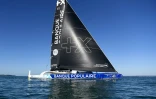 Le multicoque (Classe Ultime)" Maxi Banque Populaire XI", barré par les skippers Armel Le Cléac'h et Kévin Escoffier, le 22 octobre 2021 au large des côtes de Lorient, lors d'une sortie en mer en guise de préparation pour la Transat Jacques Vabre