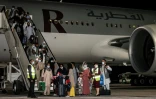 Des personnes évacuées d'Afghanistan, dont des citoyens américains, arrivent à l'aéroport de Doha le 9 septembre 2021