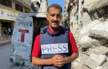 Le journaliste de l'AFP Khader Zaanoun pose pour une photo à Gaza, le 22 juillet 2025