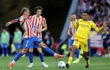 Antoine Griezmann à la lutte avec le milieu marocain de Gérone Azzedine Ounahi, lors d'un match de Liga, le 17 mai 2026 à Madrid