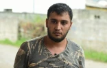 Le Syrien Guwan Belei devant le centre d'accueil des demandeurs d'asile, le 19 juin 2018 Ă Tirana, en Albanie