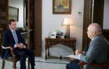 Photo fournie le 31 mars 2016 par l'agence de presse syrienne Sana du président Bachar al-Assad lors d'un entretien à l'agence de presse officielle russe Ria-Novosti à Damas