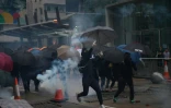 Hong Kong police fired tear gas at pro-democracy protesters after tens of thousands hit the streets once more
