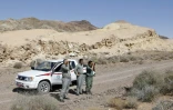 Des gardes nature recherchent des guépards dans le parc national de Garmsar, le 8 octobre 2017 en Iran
