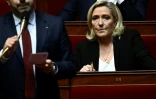 La présidente du groupe des députés RN Marine Le Pen, durant la session de questions au gouvernement à l'Assemblée nationale à Paris le 3 décembre 2024