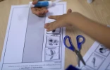 Un jeune élève travaille dans une classe d'une école de Corbeil-Essonnes le 4 septembre 2017