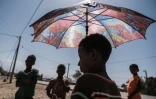 Un enfant se protège du soleil dans le camp de réfugiés érythréens de Mai Aini, en Ethiopie, le 30 janvier 2021.