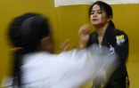 Meggie Ochoa (d) pendant une séance d'entraînement, le 2 avril 2019 à Manille, aux Philippines