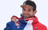 La joie du Français Mathieu Faivre, médaillé de bronze du géant des Jeux olympiques de Pékin, le 13 février 2022 au centre national de ski alpin de Yanqing