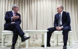 Le président russe Vladimir Poutine et le président du CIO Thomas Bach discutent lors des Jeux européens à Minsk en Biélorussiele 30 juin 2019