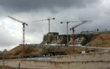 Des logements en construction dans la colonie israélienne de Ramot, le 27 janvier 2016, à Jérusalem-est
