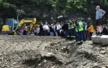 La chanceliĂšre allemande Angela Merkel visite le village de Schuld prĂšs de Bad Neuenahr-Ahrweiler, en Allemagne, le 18 juillet 2021