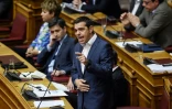 Le Premier ministre grec Alexis Tsipras s'exprime au cours d'une séance du parlement grec à Athènes le 14 juin 2018