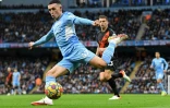 La pépite polyvalente de Manchester City Phil Foden contre Everton lors d'un match de championnat d'Angleterre à Manchester, le 21 novembre 2021 