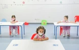 Distanciation sociale et masques dans une école maternelle de Medellin, en Colombie, le 3 septembre 2020
