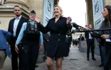 Marine Le Pen arrive à l'Assemblée nationale avec son groupe, le 10 juillet 2024