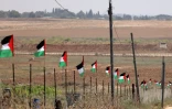 Des drapeaux palestiniens flottent près de la frontière entre la bande de Gaza et Israël, près d'un point d'observation tenu par des combattants du Hamas à l'est de Jabalia, le 30 août 2023