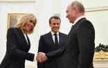 Le président russe Vladimir Poutine reçoit le président français Emmanuel Macron et sa femme Brigitte, au Kremlin le 15 juillet 2018