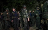 Des soldats thaïlandais près de la grotte Tham Luang dans la province de Chiang Rai le 6 juillet 2018