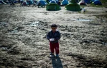 Un enfant dans le camp d'Idomeni en Grèce, le 25 mars 2016, à proximité de la frontière avec la Macédoine