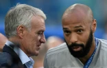Le sélectionneur français Didier Deschamps et l'entraîneur-adjoint de la Belgique Thierry Henry après la qualification des Bleus pour la finale, le 10 juil 2018 à Saint-Pétersbourg     