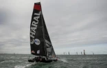 Charal, skippé par Jérémie Beyou, en duo avec Christophe Pratt, se rend sur la ligne de départ de la Transat Jacques Fabre au large du Havre, le 27 octobre 2019 