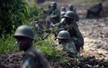 Des soldats congolais en position près d'un village proche de Goma, dans l'est de la RDC, le 16 juillet 2013