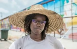L'artiste béninoise Drusille Fagnibo pendant le festival Effet Graff, le 18 mai 2022 à Cotonou, au Bénin
