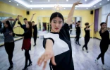 Des élèves du collège industriel et commercial d'Yiwu pendant un cours de danse, le 14 mars 2017, près de Shanghai