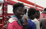 Des migrants qui viennent d'être recueillis à bord du navire Ocean Viking, affrêté par SOS Méditerranée et MSF, le 10 août 2019, en mer Méditerranée.