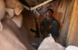 Un combattant rebelle du Front national de libération, sur une colline de la région d'Al-Eis, dans le sud-ouest de la province d'Alep en Syrie, le 7 octobre 2018