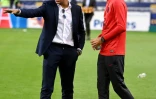 Kylian Mbappé en tenue de ville avec son entraîneur Thomas Tuchel après la victoire du Paris SG contre Lyon en finale de la Coupe de la Ligue le 31 juillet 2020 au Stade de France