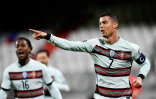 La joie de l'attaquant portugais Cristiano Ronaldo, après un but marqué contre le Luxembourg, lors des éliminatoires de la Coupe du monde 2022 au Qatar, le 30 mars 2021 à Luxembourg