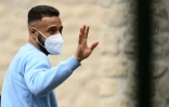 Le milieu des Bleus Corentin Tolisso arrive à Clairefontaine, le 26 mai 2021