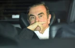 L'ancien patron de Renault Carlos Ghosn quitte les bureaux de ses avocats peu après sa sortie de prison, le 6 mars 2019 à Tokyo