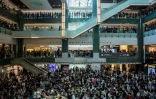 Thousands gathered inside a mall in the northern town of Sha Tin to sing protest songs and make origami cranes