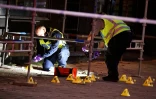 Des policiers sur les lieux de la fusillade à Malmö, en Suède, le 18 juin 2018