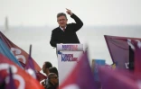 Le candidat à la présidentielle de "La France Insoumise" (LFI) Jean-Luc Melenchon (C) lors d'un meeting de campagne à Marseille, sud, le 27 mars 2022
