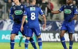 Les joueurs de Bastia se congratulent après le 1er but inscrit par Gaël Danic (N.8) sur la pelouse de sedan, le 2 janvier 2015