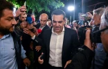 Alexis Tsipras, leader du parti de gauche grec Syriza, arrive au siège de son parti, le 21 mai 2023 à Athènes