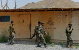 Des soldats de l'armée afghane marchent dans une base américaine à Achin, le 26 juillet 2020