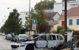La carcasse de véhicules incendiés, parmi lesquels une voiture de police, à Viry-Chatillon le 8 octobre 2016