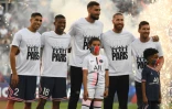 Le Marocain Achraf Hakimi, le Néerlandais Georgiio Wijnaldum, l'Italien Gianluigi Donnarumma, l'Espagnol Sergio Ramos et l'Argentin Lionel Messi, sont présentés aux supporters du Paris-Saint-Germain, avant le match de L1 contre Strasbourg, le 14 août 2021 au Parc des Princes  