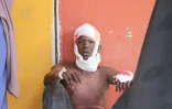 Un blessé est soigné dans un hopital de Mogadiscio le 28 décembre 2019 après un grave attentat.