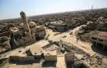 Vue des destructions autour de l'église ro), le 14 mars 2018 en Irak, huit mois après le départ du groupe Etat islamique (EI)