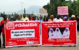 Les membres de "Bring Back Our Girls" participent le 16 octobre 2018 à Abuja à une manifestation en faveur des trois femmes humanitaires enlevéees par Boko Haram
