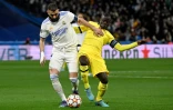 Karim Benzema (à gauche) et N'Golo Kanté pendant le quart de finale retour de la Ligue des Champions Real Madrid - Chelsea, le 12 avril 2022 au stade Santiago Bernabeu à Madrid