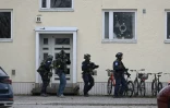 Des policiers finlandais sur le site d'une fusillade dans une école à Vantaa, le 2 avril 2024