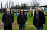 Trois amis de Michel Platini, Gérard Keff, Frédéric Bragard et Michel Keff (de gà d), posent sur la pelouse du "Complexe sportif Platini", le 13 janvier 2021 à Joeuf