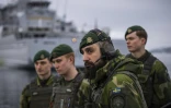Des soldats suédois d'une unité amphibie participent à un exercice de l'Otan à Alta, dans l'Arctique norvégien, le 8 mars 2024